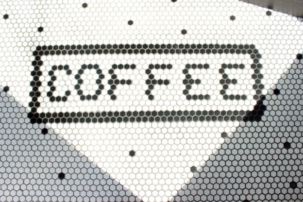 Coffee spelled in flooring